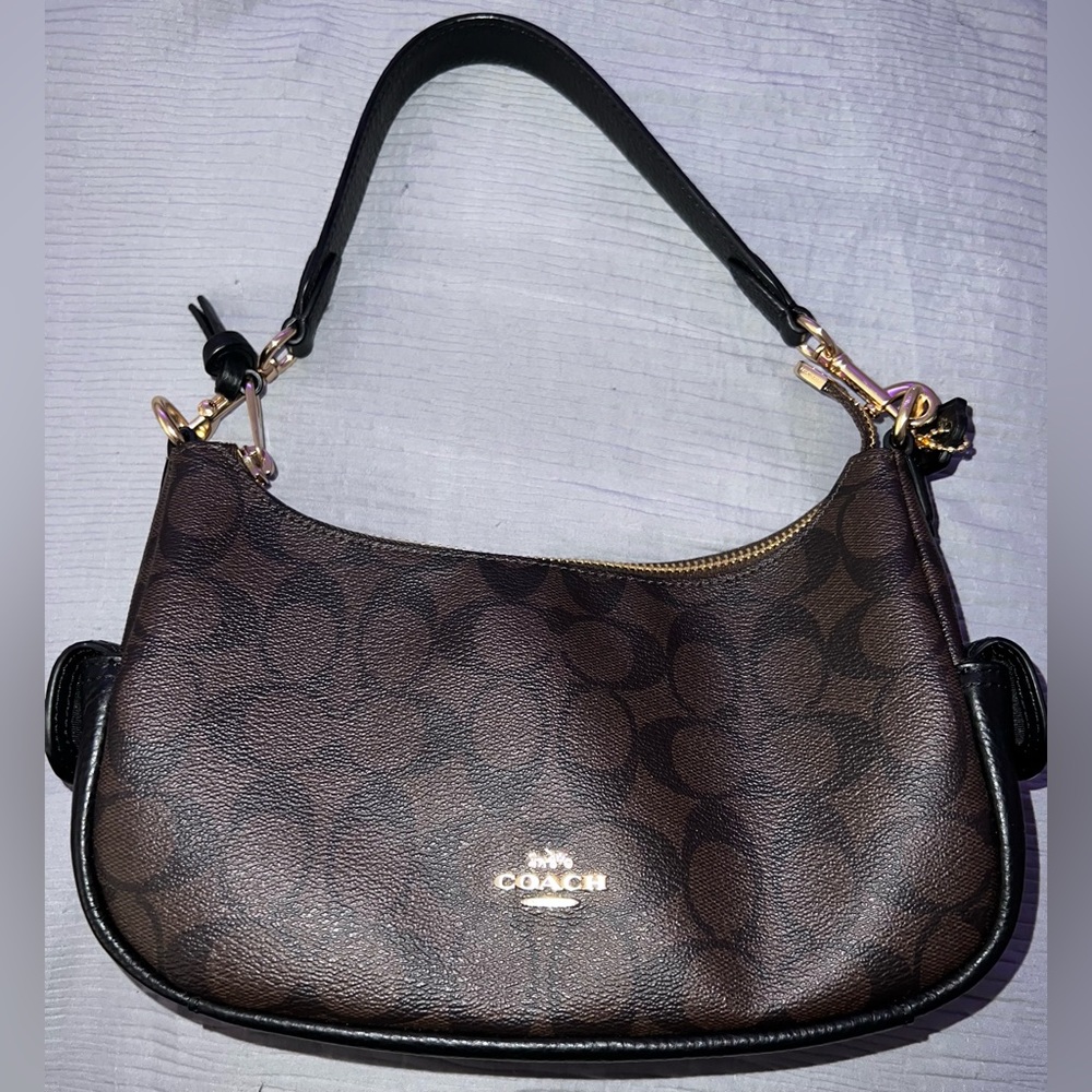 PENNIE SHOULDER BAG 25 IN SIGNATURE CANVAS
